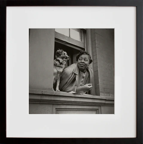 A woman and her dog in the Harlem section 2